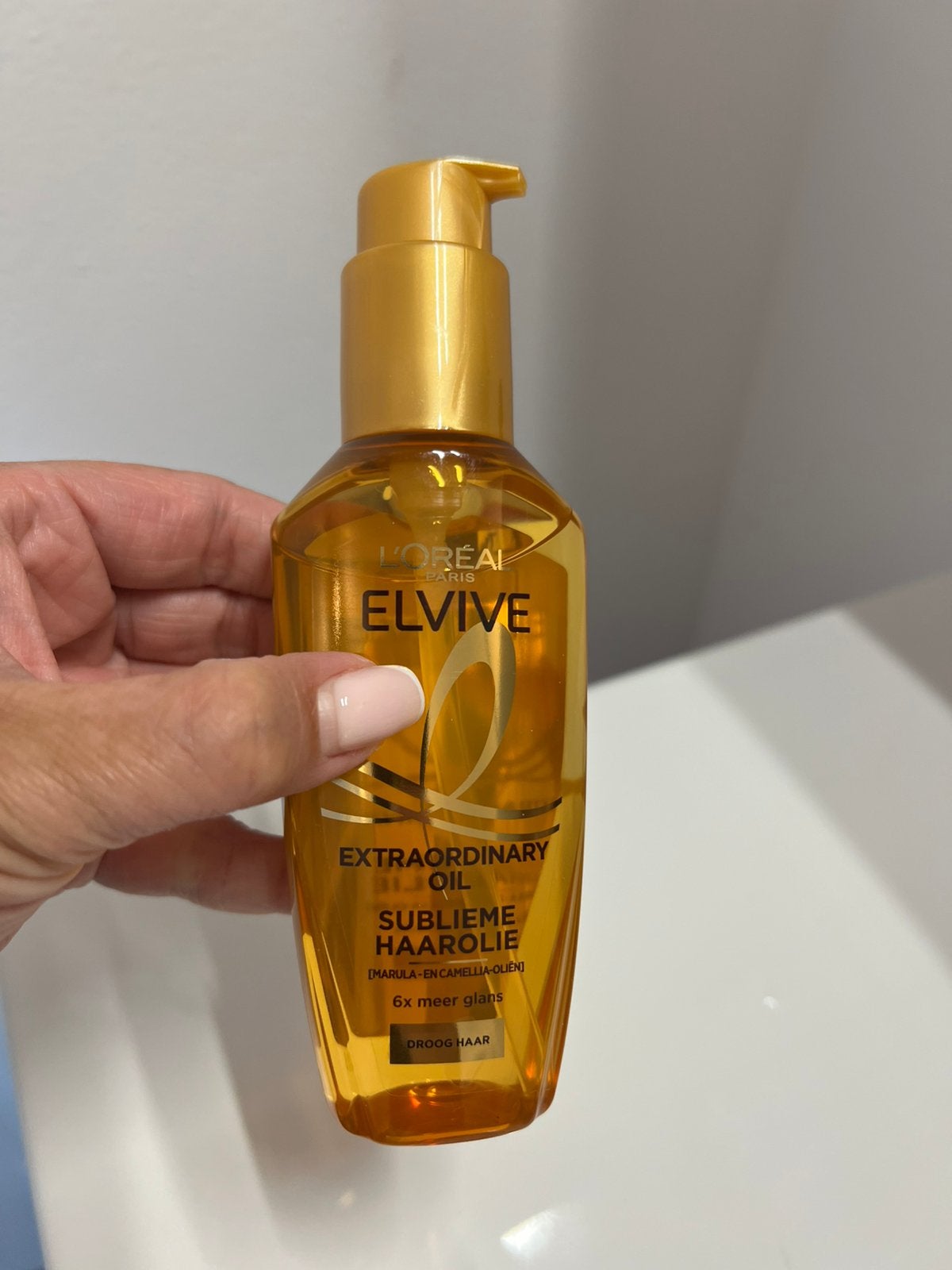 Loreal elvive haarolie, Ophalen of Verzenden, Zo goed als nieuw, Haarverzorger of -hersteller
