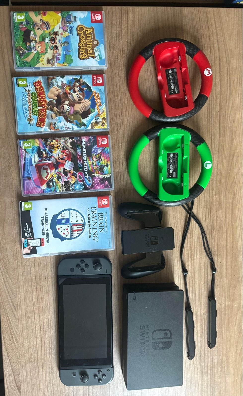 Nintendo Switch met 4 games en accessoires, Met 2 controllers, Ophalen of Verzenden, Switch Original, Gebruikt