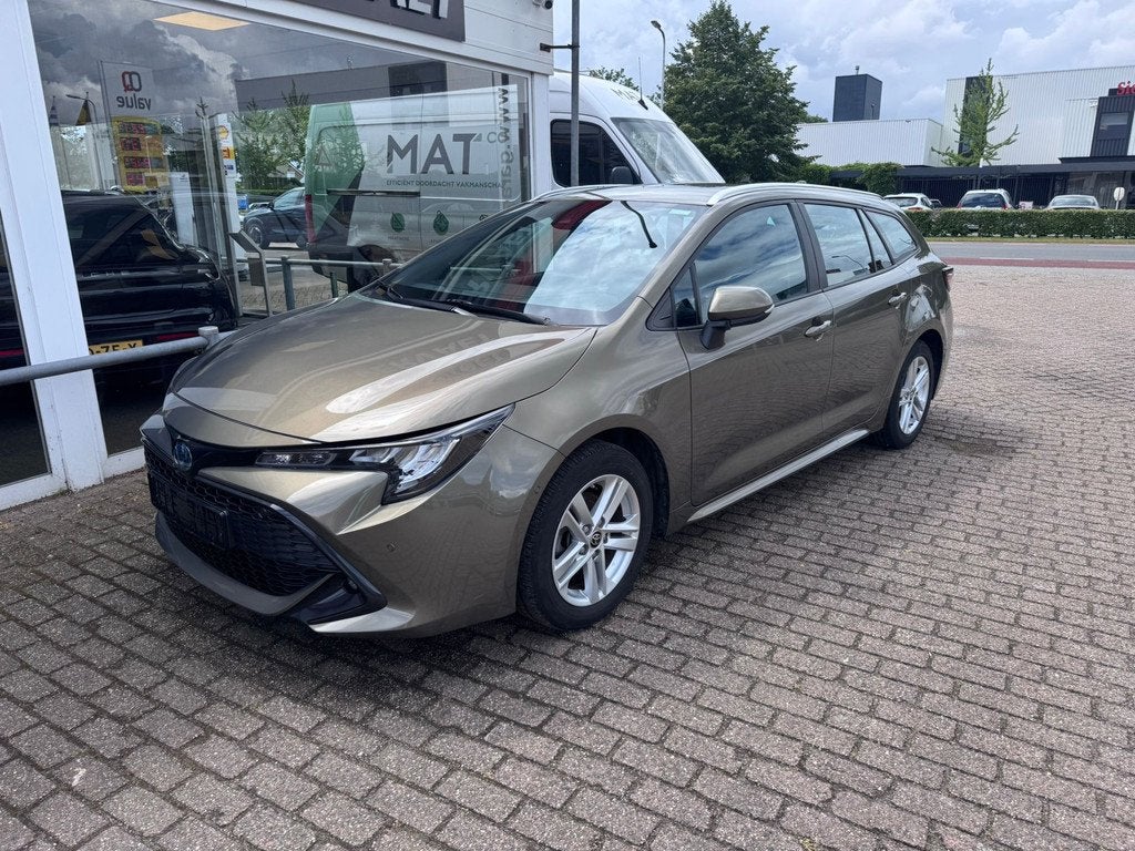 Toyota Corolla Touring Sports 1.8 Hybrid Business (bj 2023), 1345 kg, Gebruikt, 4 cilinders, Corolla