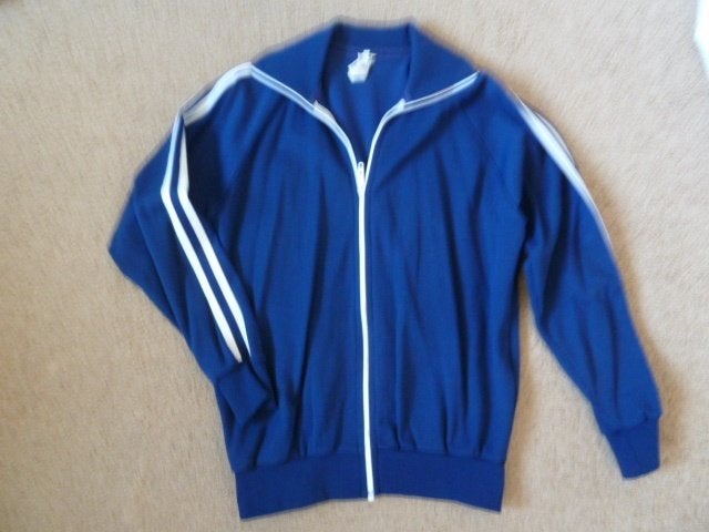 Monsanto trainingspak maat XS z.g.a.n., Blauw, Overige typen, Ophalen of Verzenden, Zo goed als nieuw