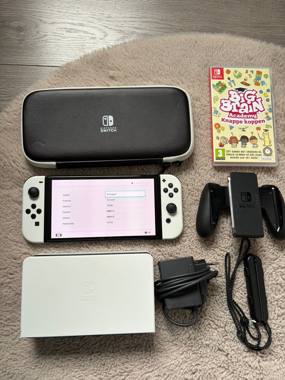 Nintendo Switch OLED wit + spel + accessoires – Complete set