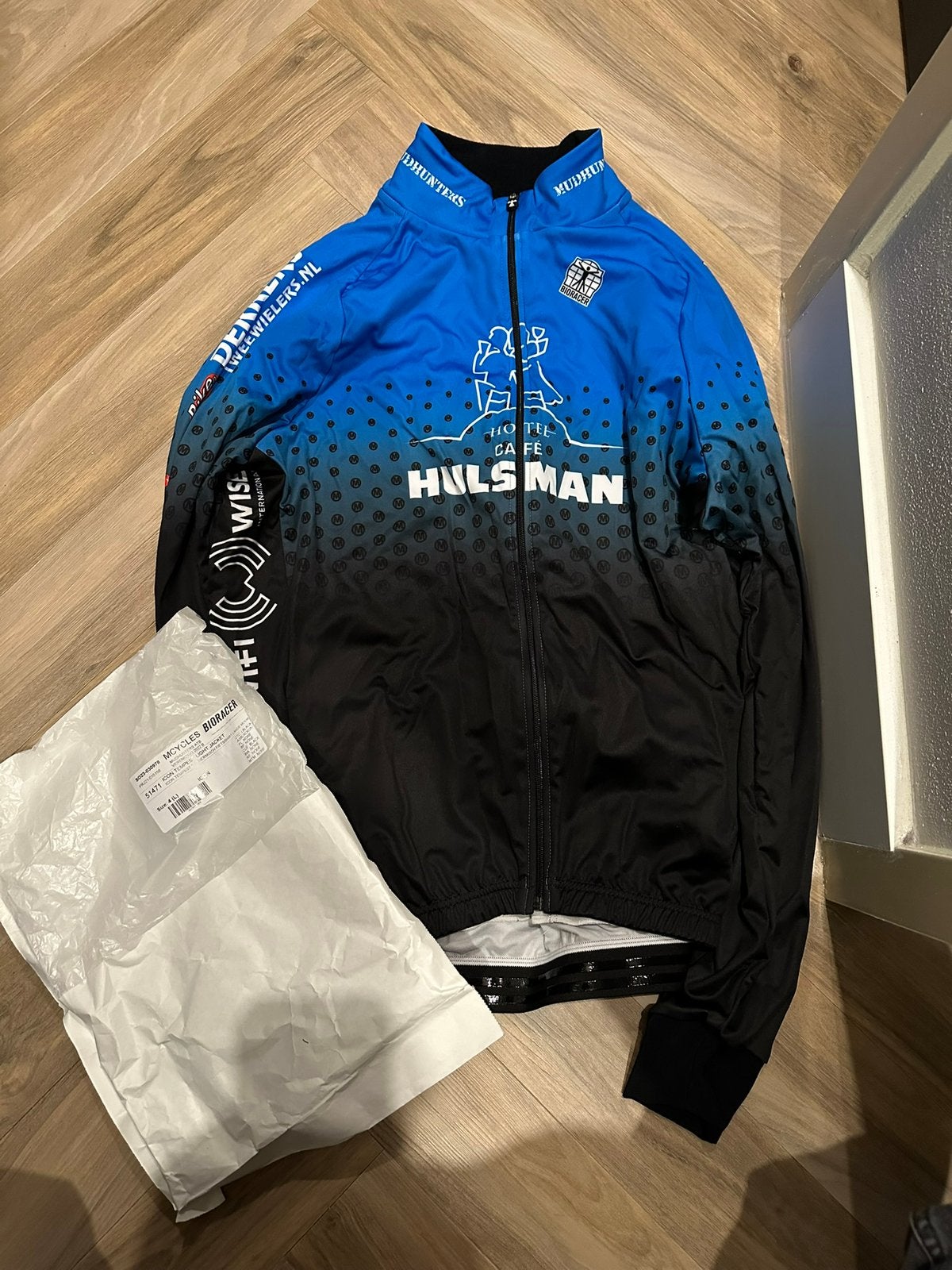 Fiets jas, maat L, Bioracer. Nieuw., Ophalen of Verzenden, Nieuw, L, Bovenkleding