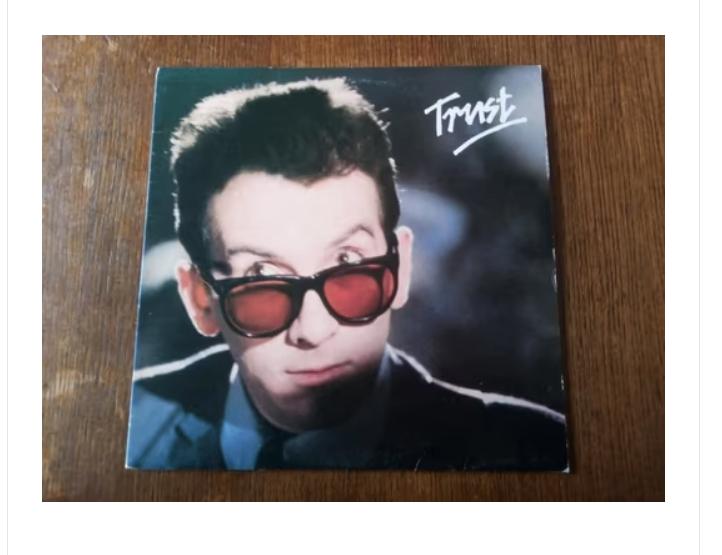 original lp- elvis costello- trust uit 1981, Ophalen of Verzenden, Zo goed als nieuw, 12 inch
