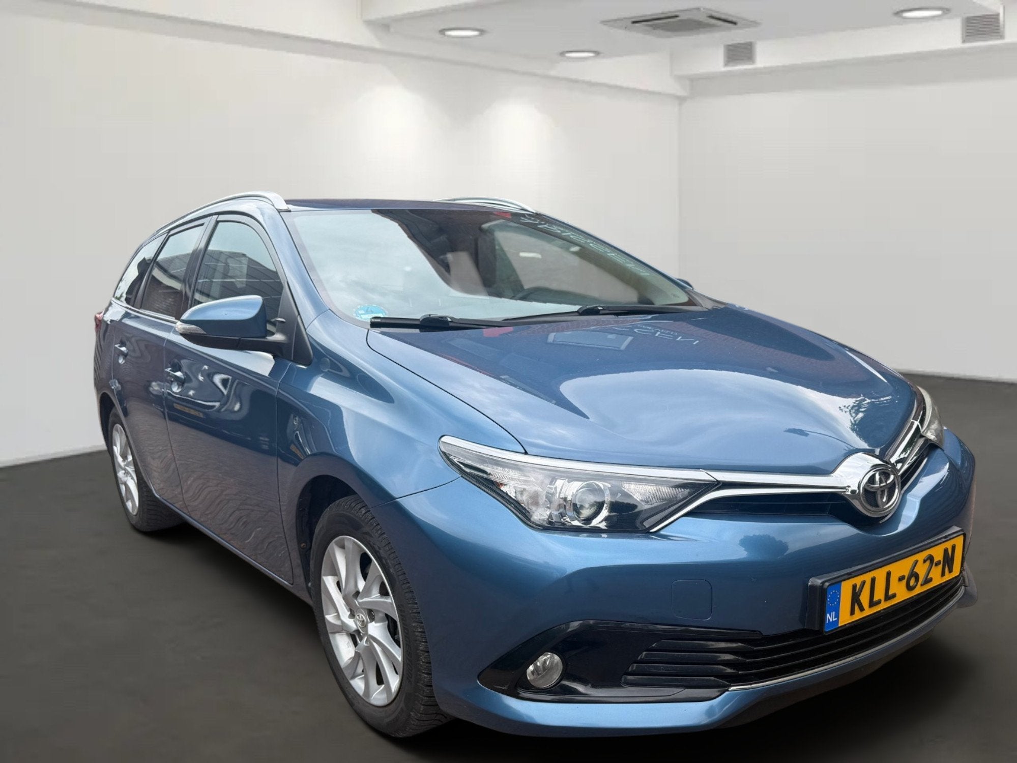 Toyota Auris Touring Sports 1.2T Aspiration Trekhaak, Auto's, Gebruikt, Euro 6, 4 cilinders, Blauw