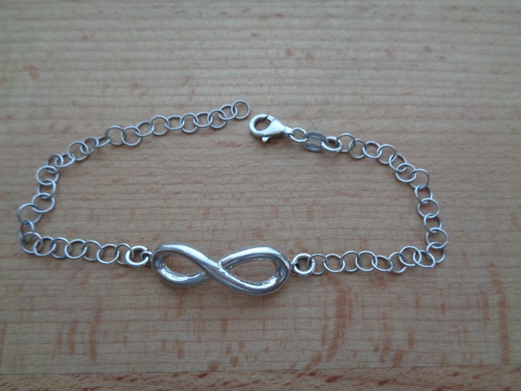 zilveren infinity armband [1113], Verzenden, Zo goed als nieuw, Zilver, Zilver