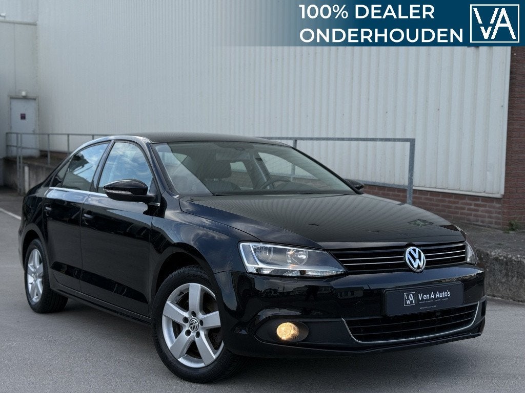 Volkswagen Jetta 1.4 TSI Highline | DSG | Leder | NL-AUTO, Automaat, 4 cilinders, Leder en Stof, Zwart
