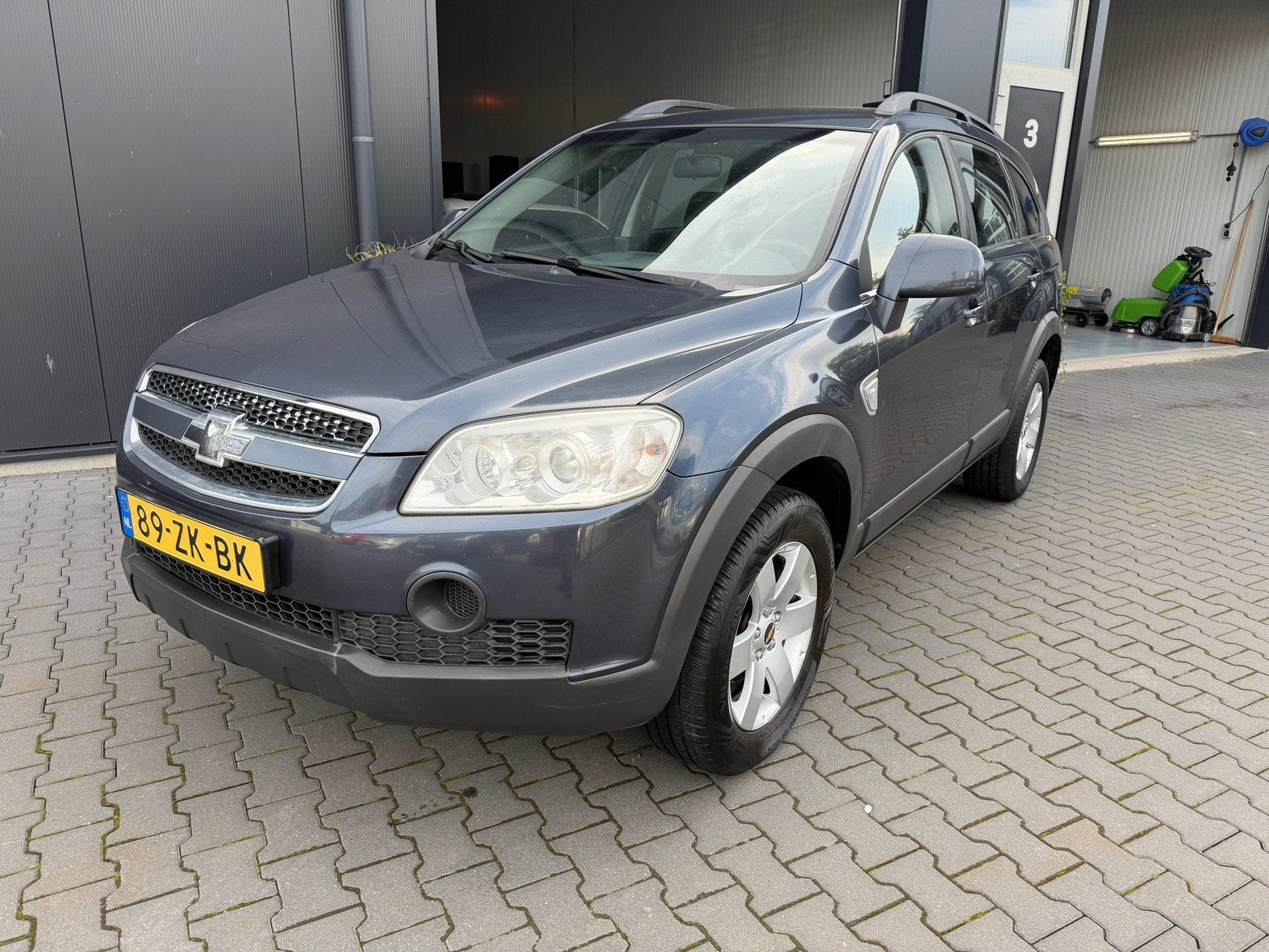 Chevrolet Captiva 2.4i Style 2WD 7 pers, Auto's, Stof, Gebruikt, Zwart, Bedrijf