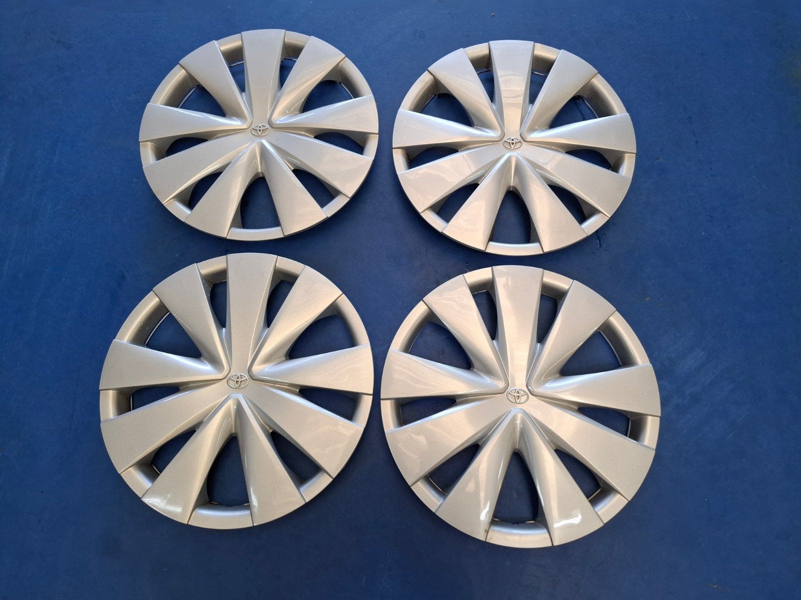 Orginele Toyota 15 Inch Wieldoppen, Auto diversen, Wieldoppen, Ophalen of Verzenden, Zo goed als nieuw