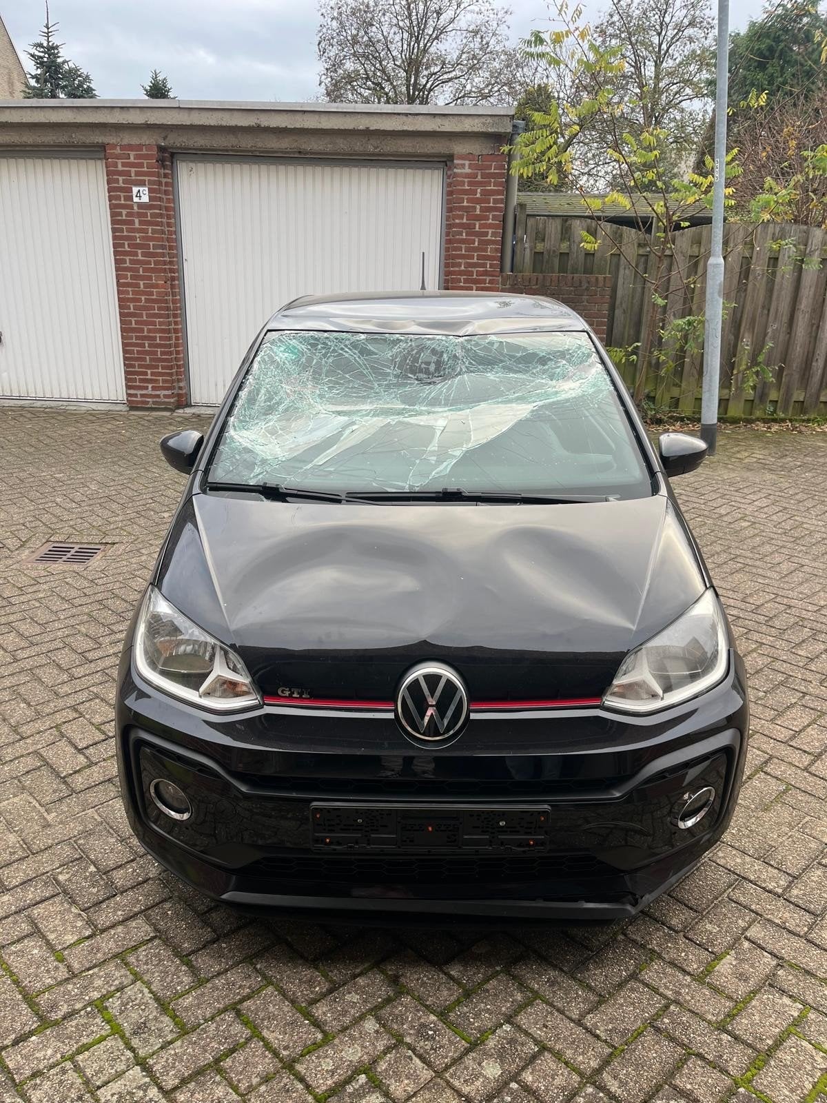 VW Up! GTI bj, 2021, Ophalen, Volkswagen, Zwart, Handgeschakeld