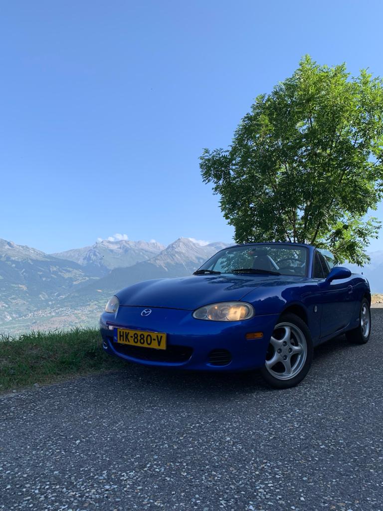 Mazda MX-5 1.6 I 2002 Blauw, Auto's, Mazda, 40 €/maand, Zwart, 4 cilinders, Cabriolet
