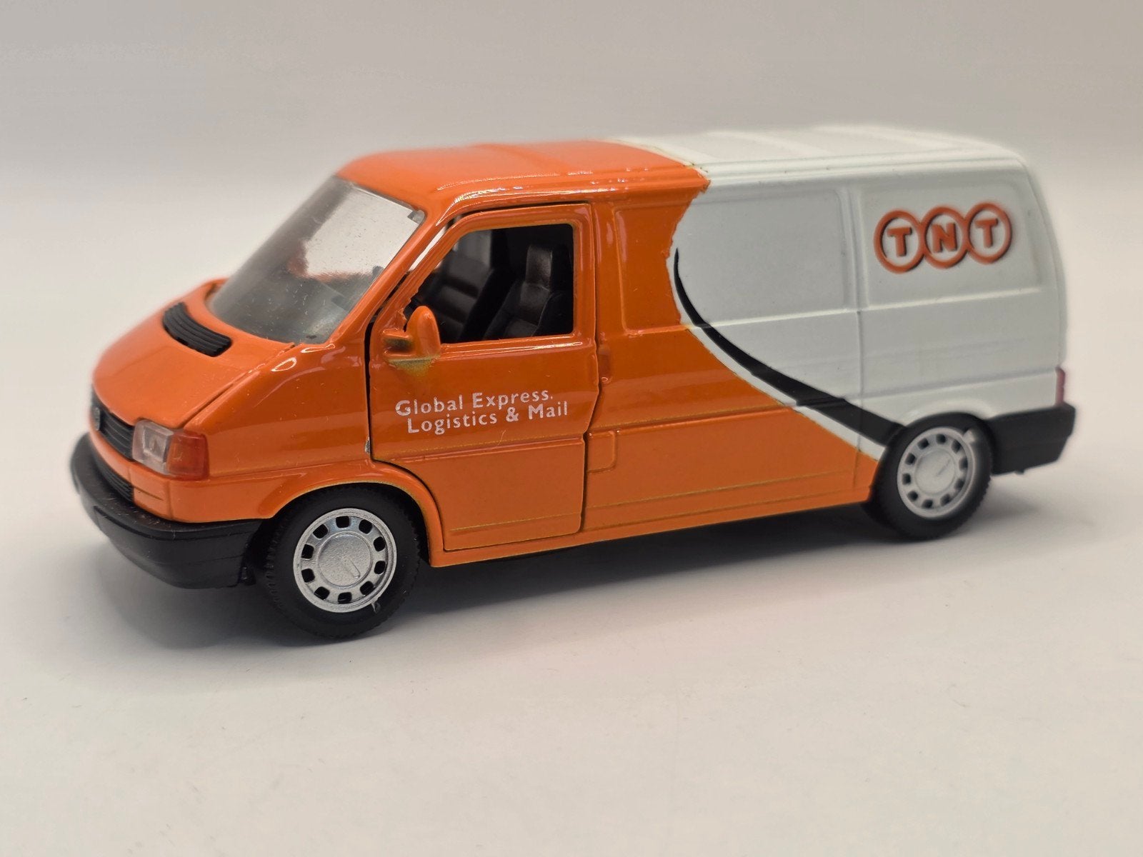 Transporter t4 tnt, Hobby en Vrije tijd, Modelauto's | 1:43, Ophalen of Verzenden, Zo goed als nieuw, Auto