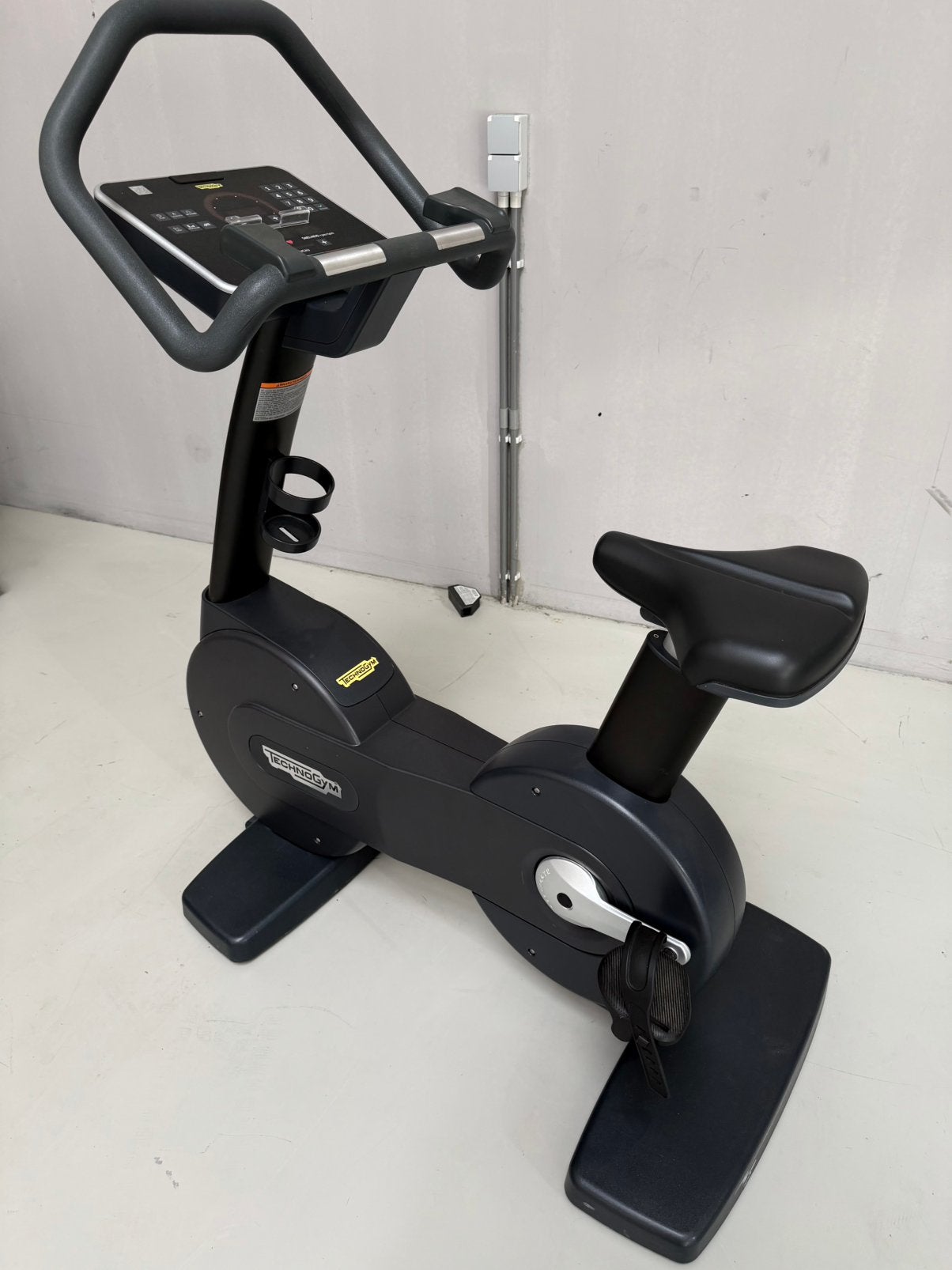 TECHNOGYM EXCITE BIKE - Hometrainer Thuis of Sportschool, Ophalen of Verzenden, Zo goed als nieuw, Benen, Overige typen