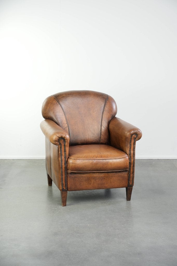 Schapenleren armchair afgewerkt met siernagels, Huis en Inrichting, Fauteuils, Ophalen, Gebruikt, ., Engels, Vintage