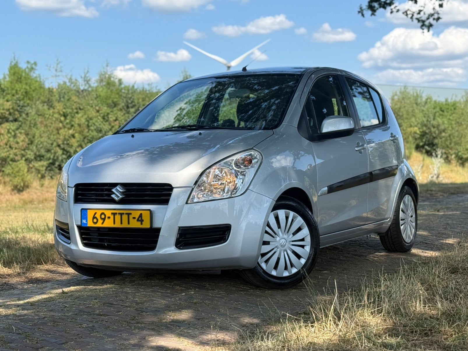 Suzuki Splash 1.0 2012 | NW. APK! | AIRCO | PDC | ELEK. PAKK, Auto's, Stof, 31 €/maand, 4 cilinders, Origineel Nederlands
