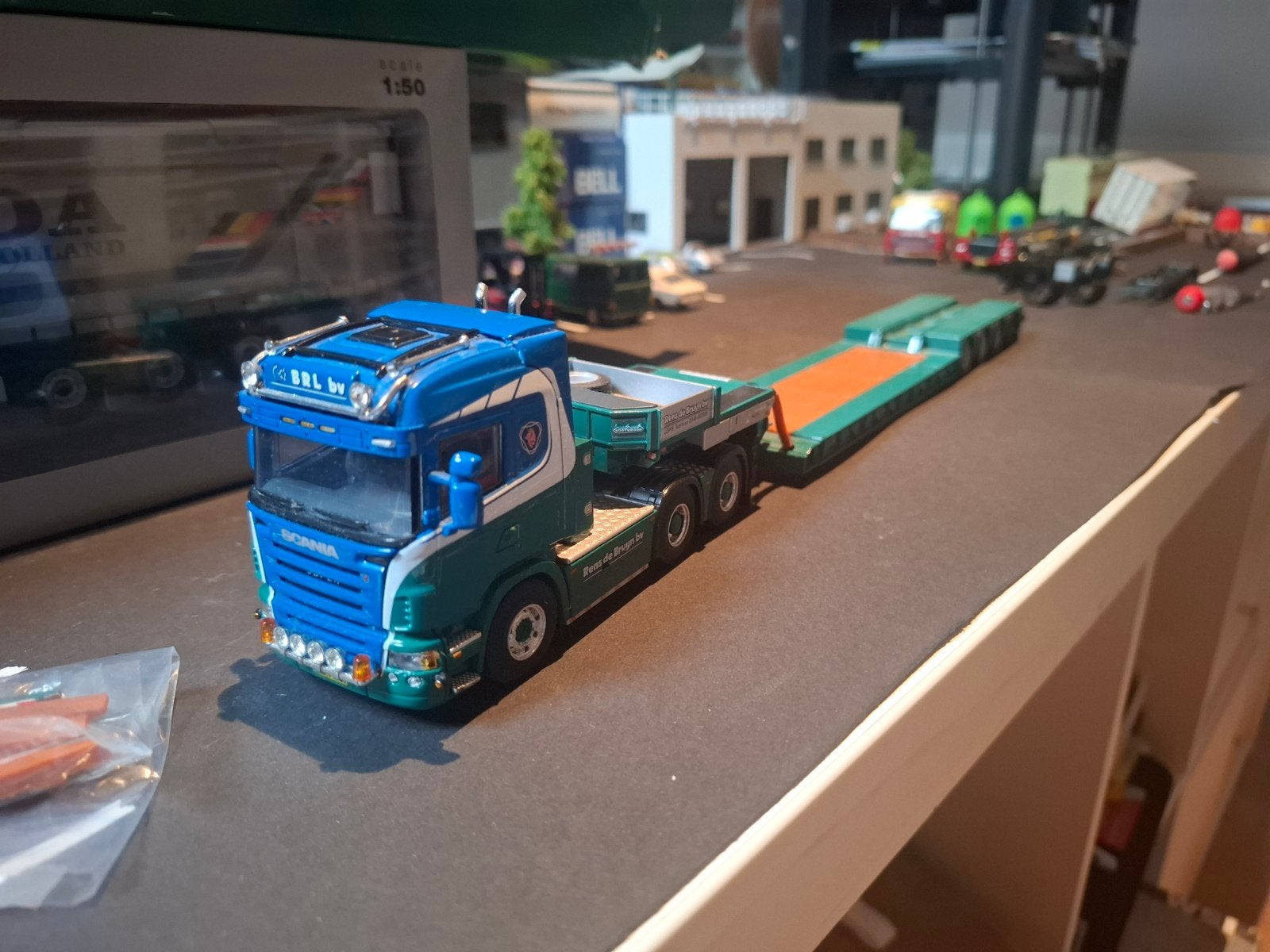 scania rens de bruin, Hobby en Vrije tijd, Modelauto's | 1:50, Ophalen of Verzenden, Nieuw, Bus of Vrachtwagen, Wsi