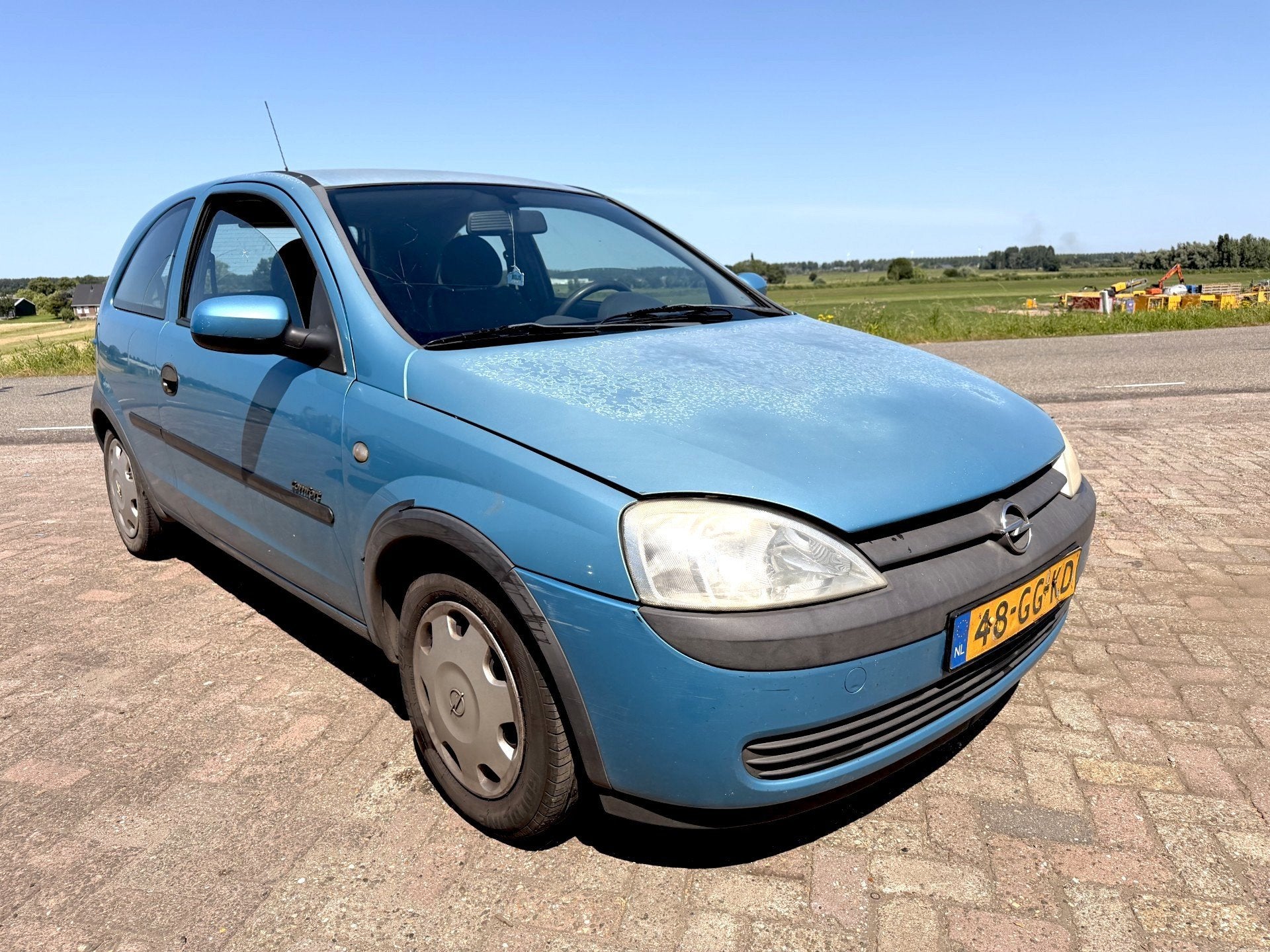 Foto 3 van Opel Corsa 1.0-12V Comfort LAGE KM's 156346 NAP auto is rijb