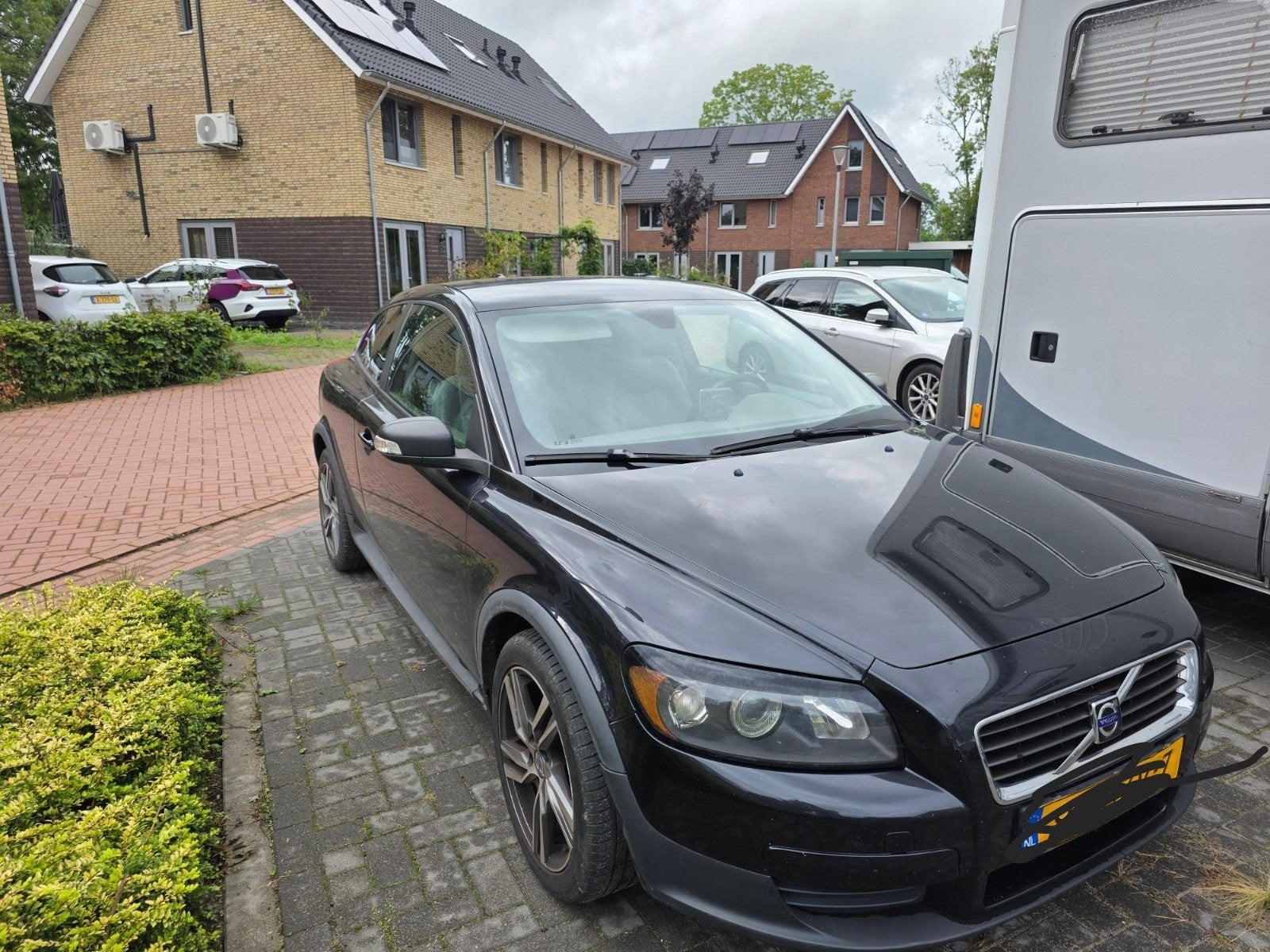 Volvo C30 1.6 2008 Zwart, Auto's, Voorwielaandrijving, 1596 cc, 4 cilinders, 4 stoelen