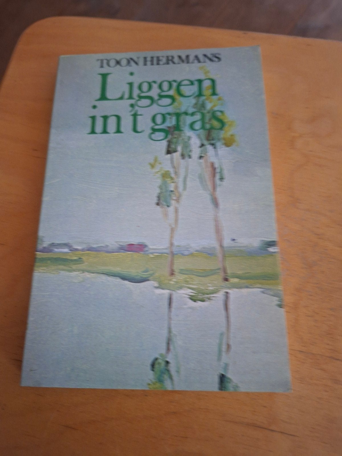 Toon Hermans - Liggen in 't gras (Boek), Ophalen of Verzenden