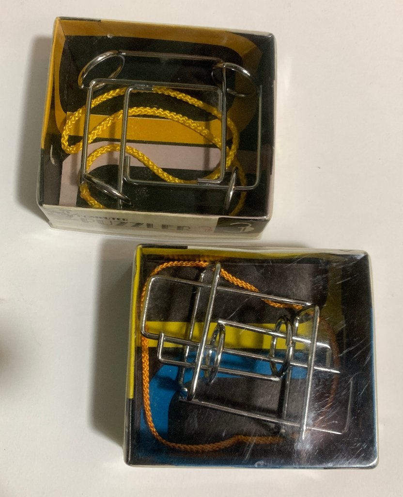 2 Puzzels Puzzler 1 en 3 - metalen vorm, ringen en koord, Ophalen of Verzenden, Minder dan 500 stukjes, Nieuw, Rubik's of 3D-puzzel