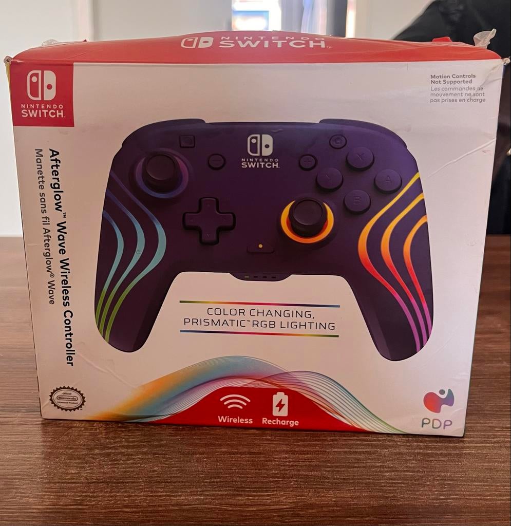 Nieuwe paarse Nintendo Switch controller (Afterglow Wave), Spelcomputers en Games, Spelcomputers | Nintendo Switch, Nieuw, Met 1 controller