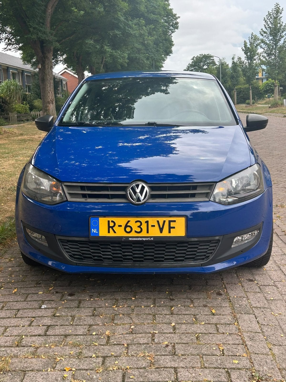 Volkswagen Polo 1.2 51KW 2009 Blauw, Auto's, Voorwielaandrijving, 40 €/maand, Zwart, Blauw