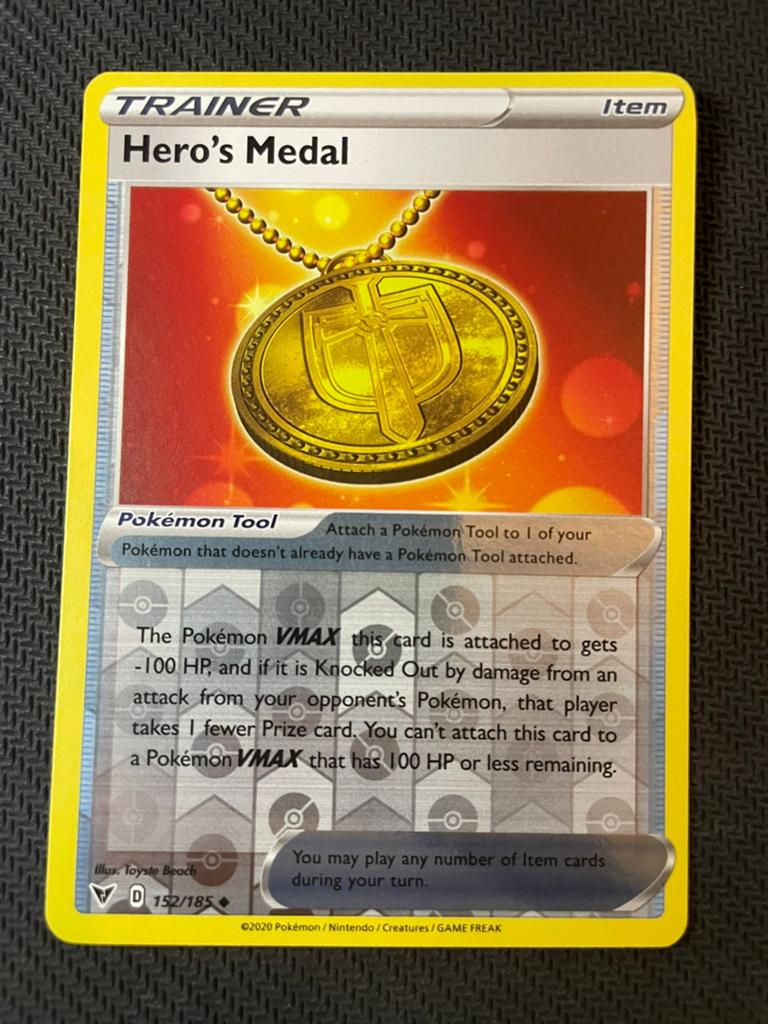 Hero’s Medal 152/185 Reverse Holo Vivid Voltage Packfresh, Ophalen of Verzenden, Zo goed als nieuw