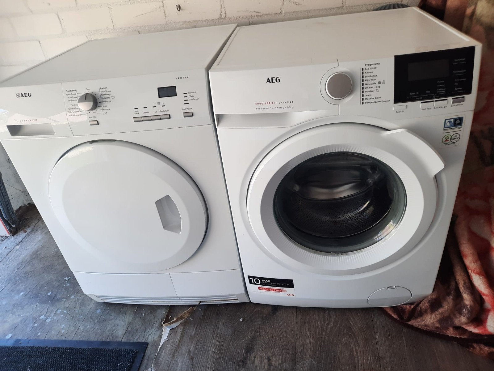 Setje AEG wasmachine en warmtepompdroger, 6 tot 8 kg, Ophalen of Verzenden, Minder dan 85 cm