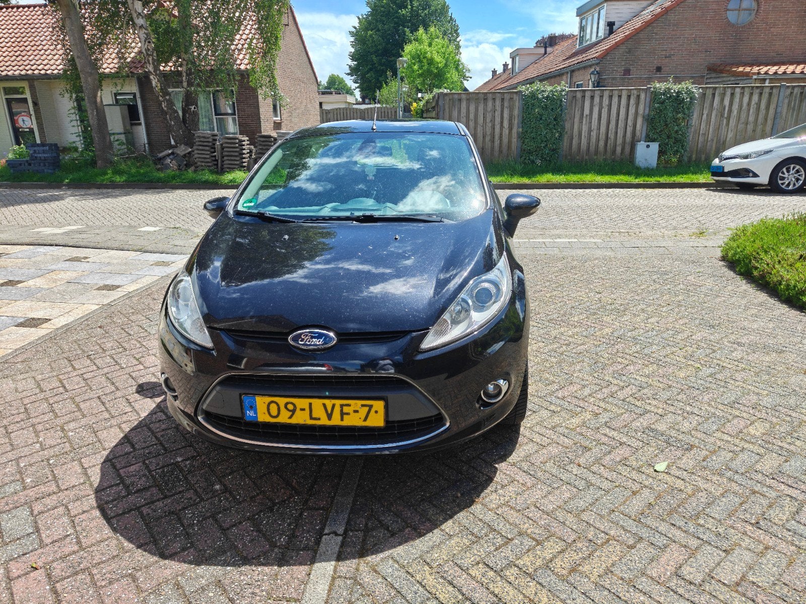 Ford Fiësta 1.25 60KW 5DR 2010 Zwart, Voorwielaandrijving, Euro 5, Stof, 1242 cc