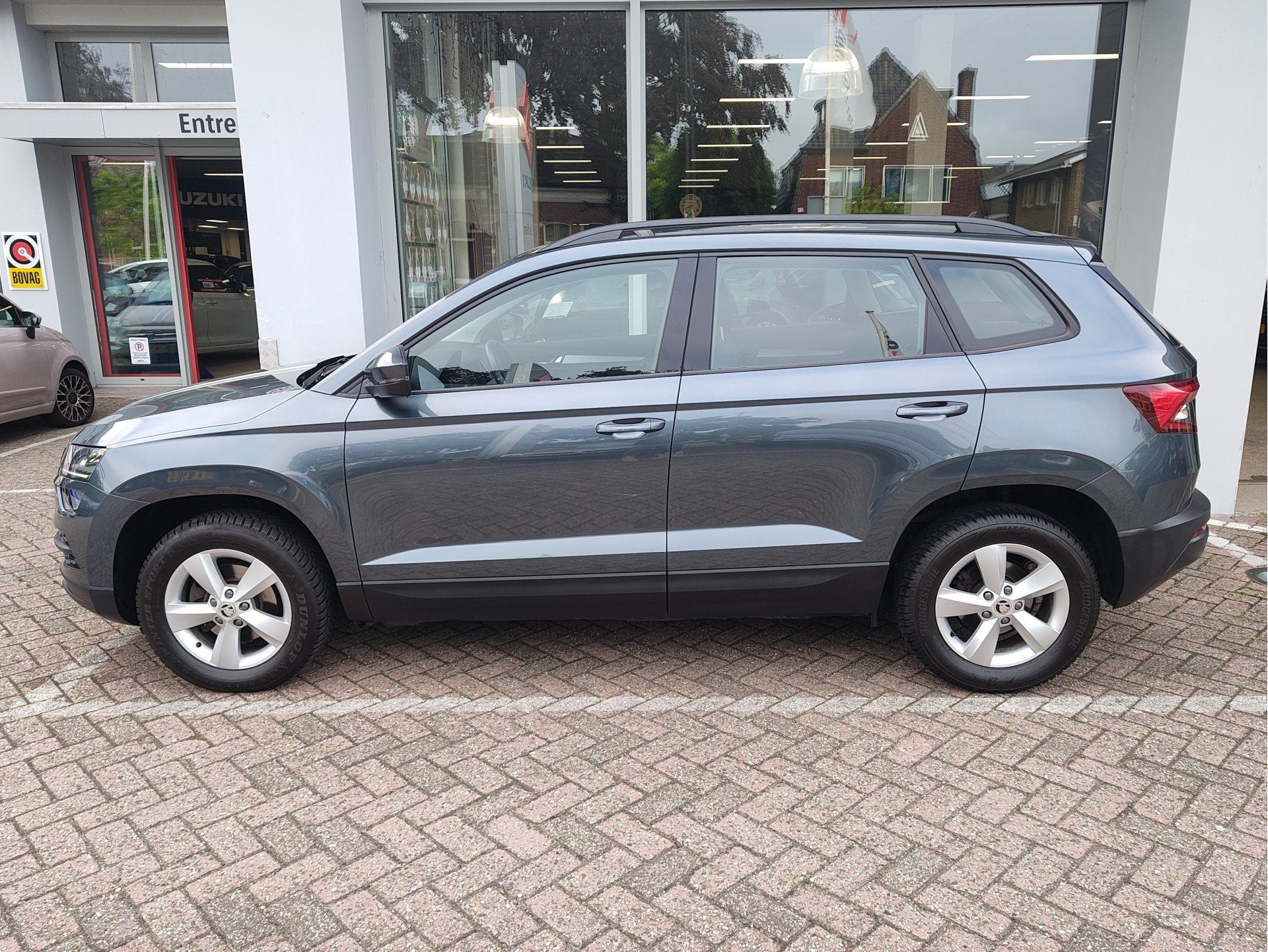 Skoda Karoq 1.0 TSI AMBITION BUSINESS DSG Navi | Clima | Cru, 12 maanden, Stof, Gebruikt, 1261 kg