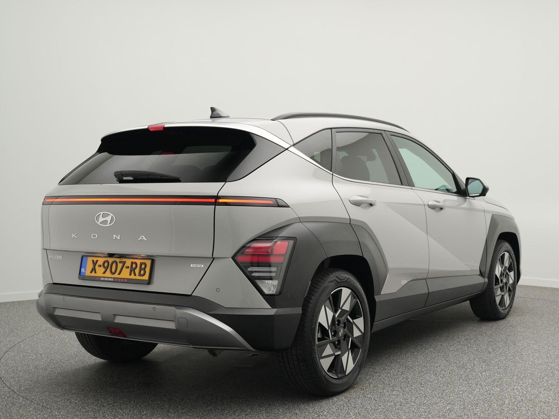 Hyundai Kona 1.6 GDI HEV Premium | Leder | Stoelverkoeling/v, Auto's, Gebruikt, Euro 6, 2 kWh, Lichtsensor