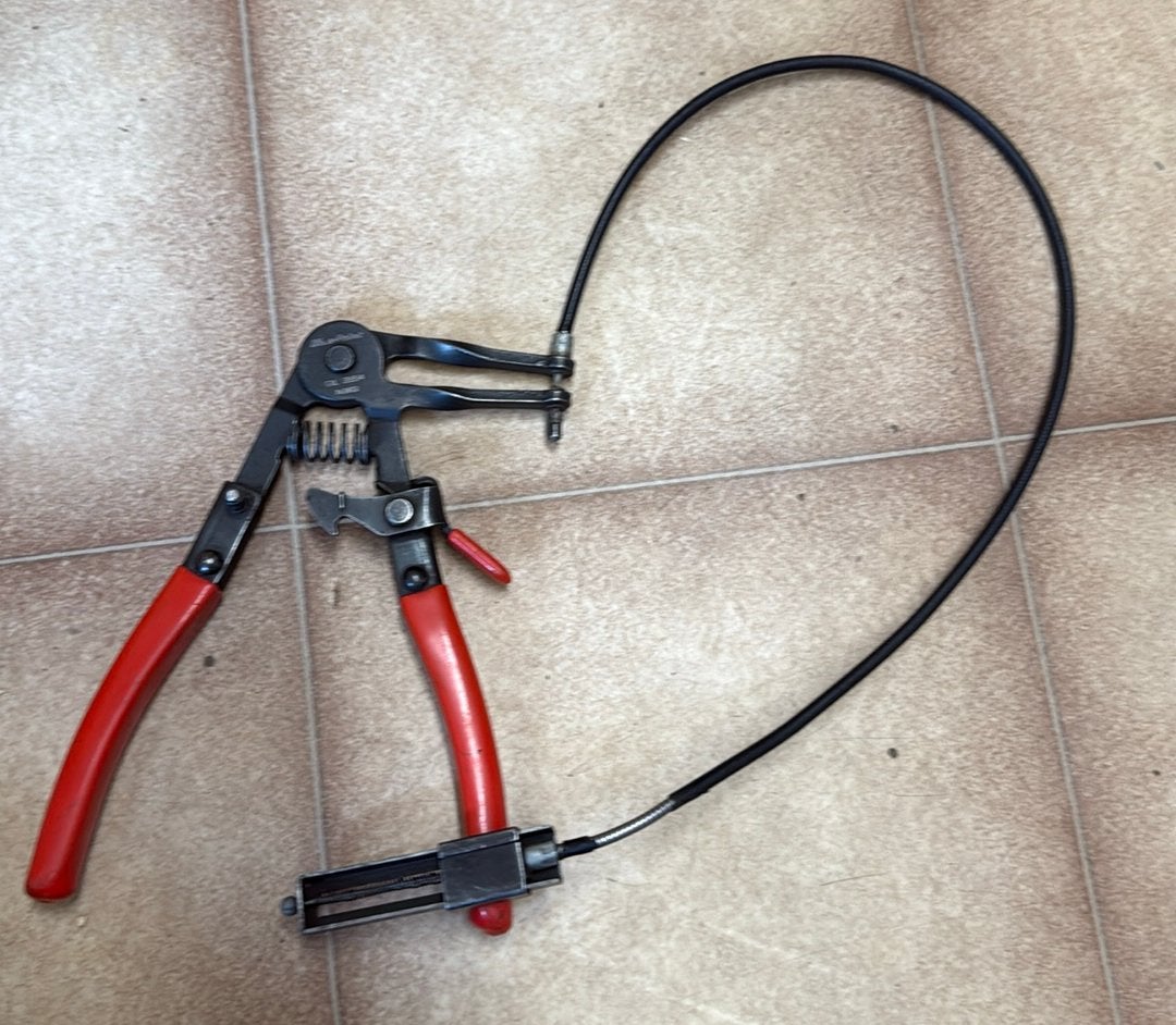 Slangklem tang met flexibele kabel, Ophalen of Verzenden, Gebruikt, Universele onderdelen