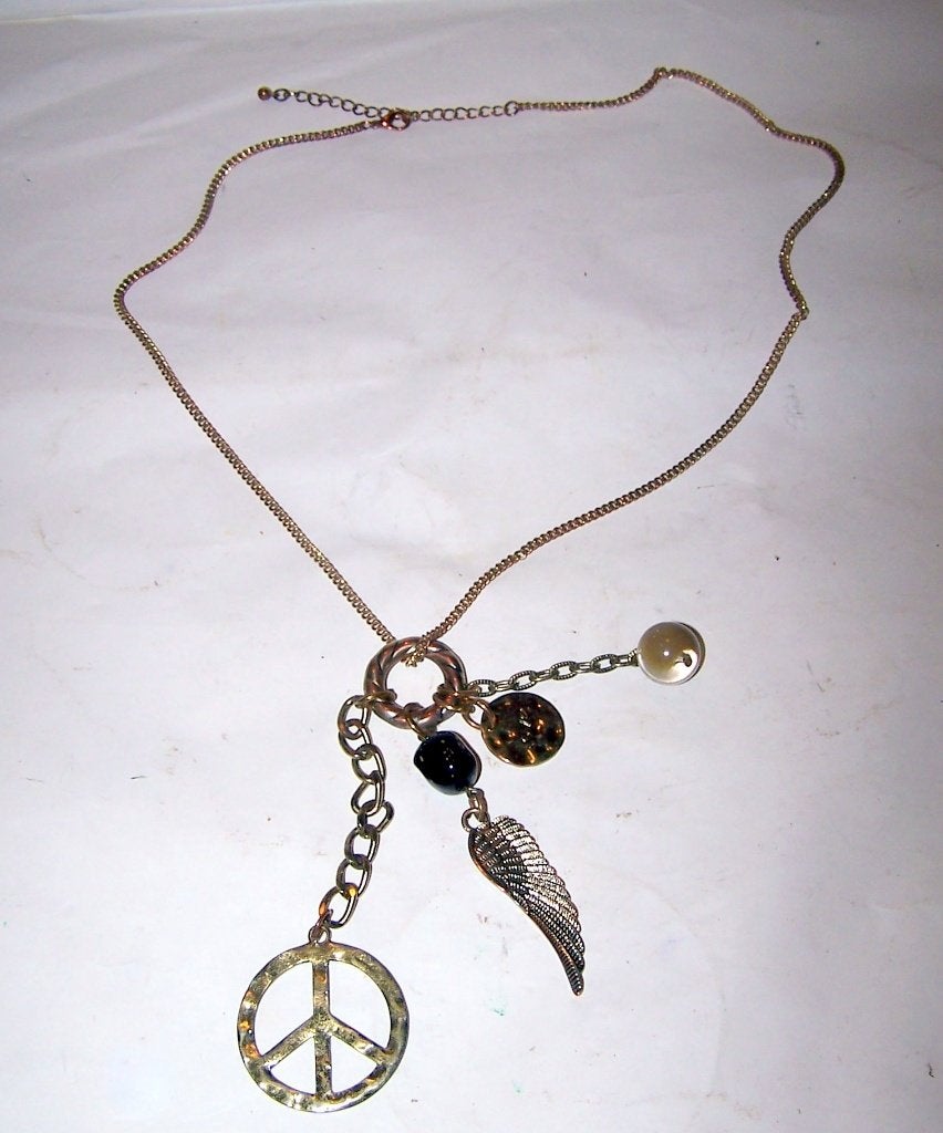Vintage "Hippie" Ketting met Vredesteken, Vleugel en Kralen., Ophalen of Verzenden, Zo goed als nieuw, Goud, Overige materialen
