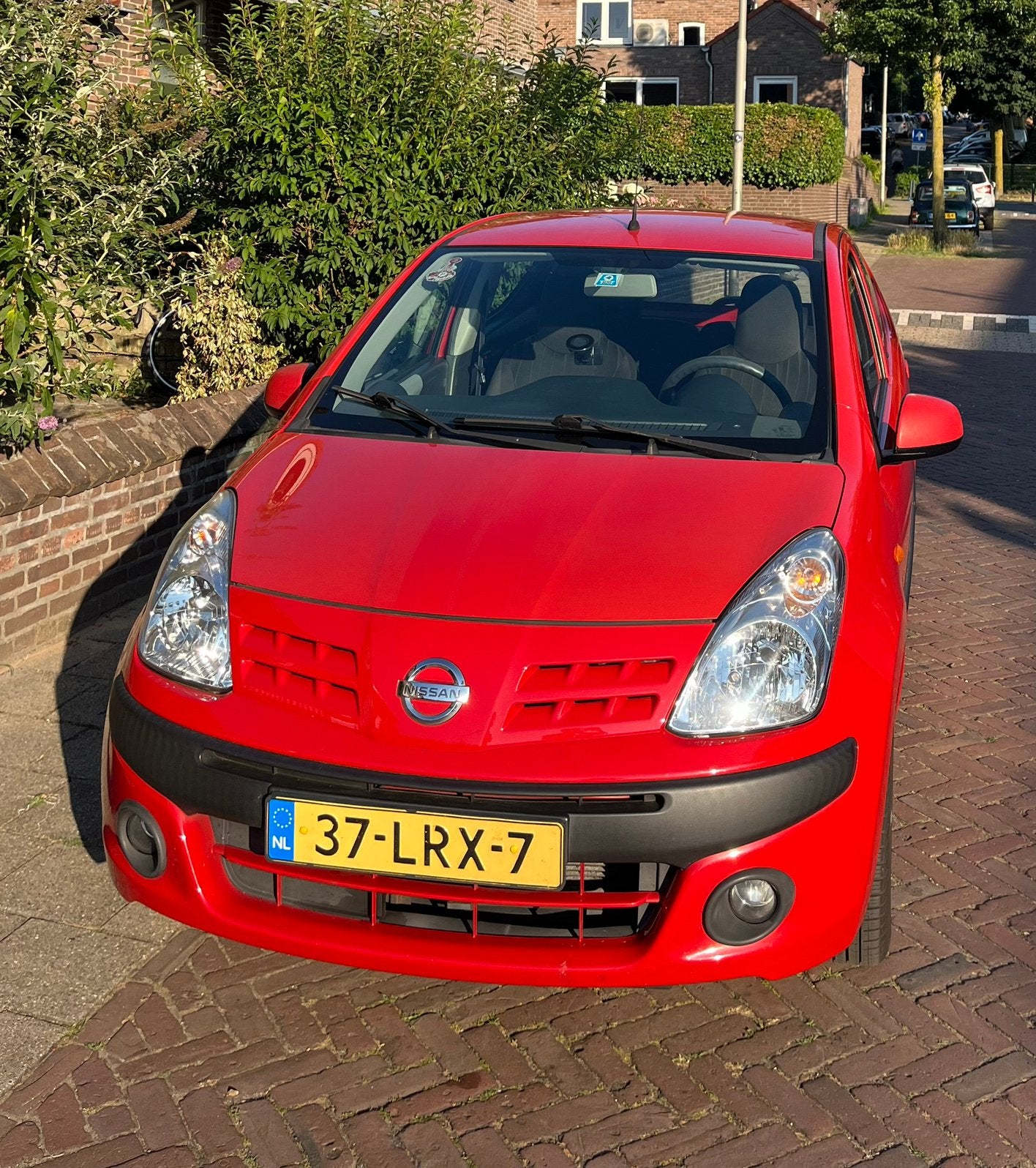 Nissan Pixo 1.0 50KW 5D 2010 Rood Airco APK 25/11/2026, Auto's, Nissan, Voorwielaandrijving, 200 kg, 4 stoelen, Origineel Nederlands