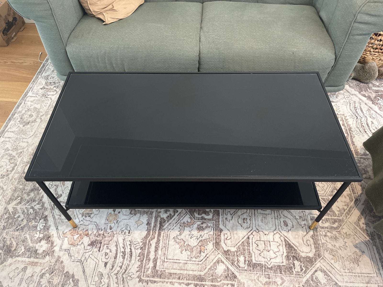 Moderne salontafel met zwart glas en gouden accenten, Ophalen, Gebruikt, 100 tot 150 cm, 50 tot 100 cm