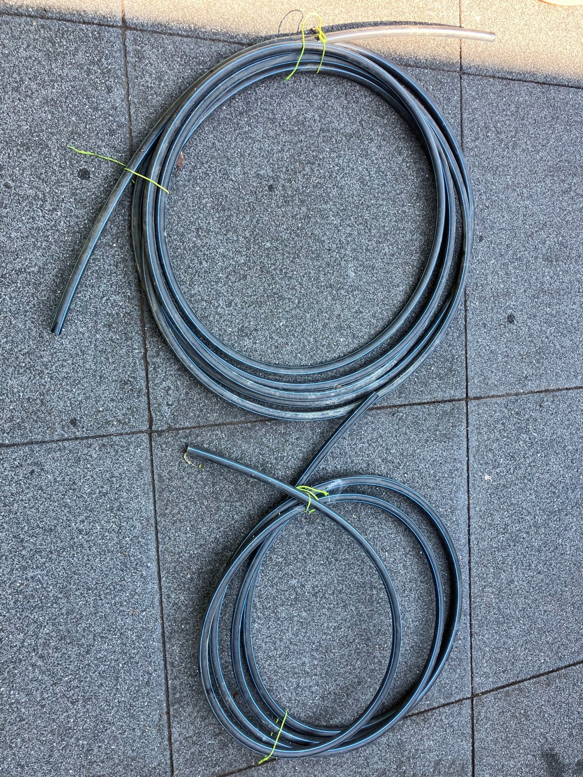 HDPE tyleenslang, zwart met blauwe streep, Overige materialen, Gebruikt, 6 meter of meer, Overige typen