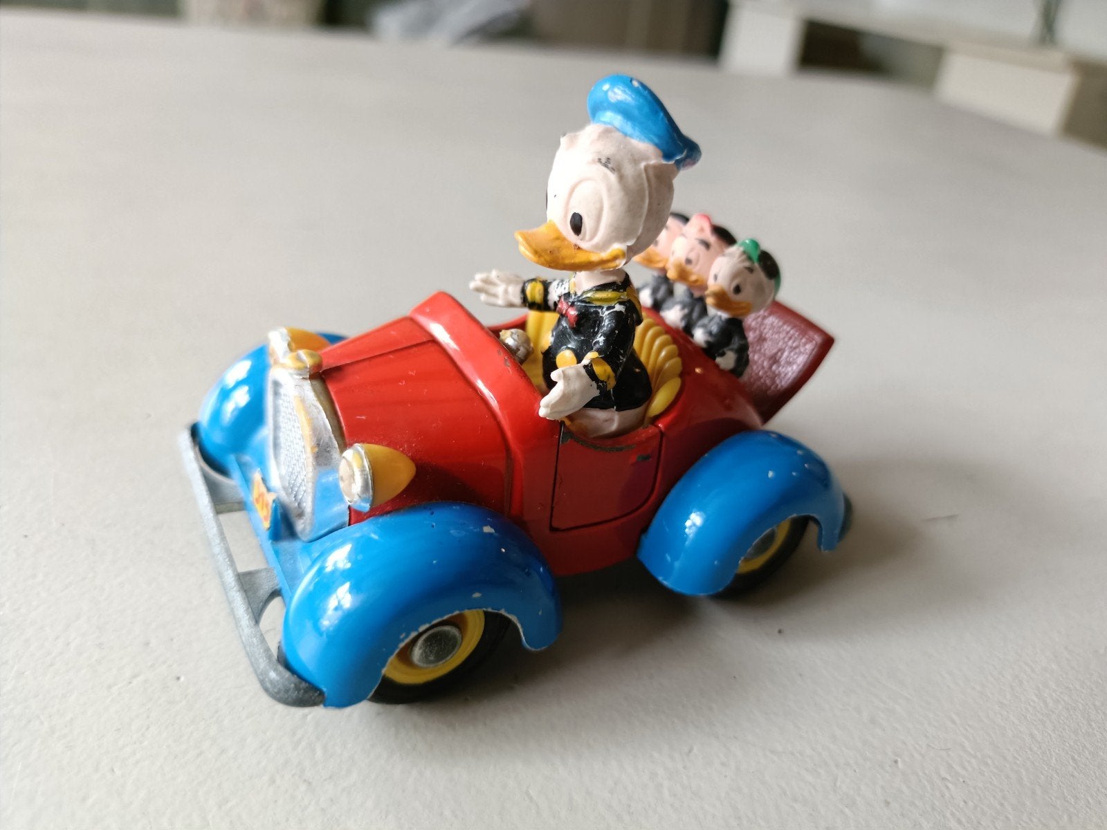 Politoys 554 Donald Duck-speelgoedauto, Verzamelen, Ophalen of Verzenden, Donald Duck, Gebruikt, Beeldje of Figuurtje