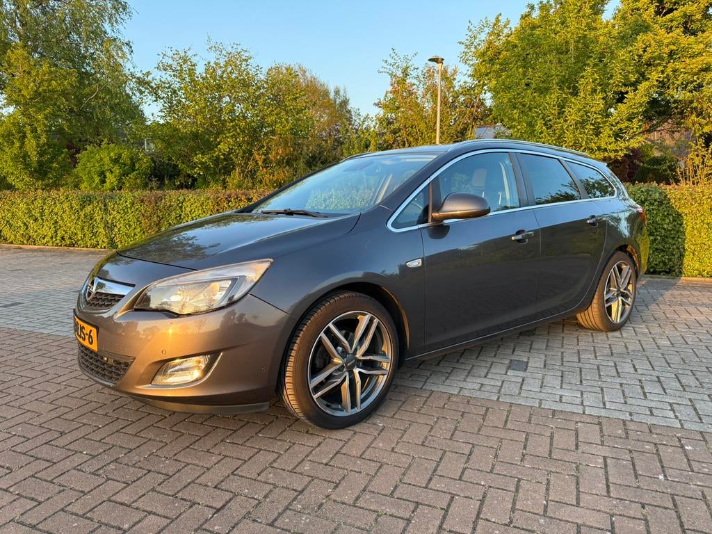 Opel Astra 1.4 Turbo 103KW | Schadevrij | Leer | Navi | PDC, Auto's, Voorwielaandrijving, Zwart, 4 cilinders, 1337 kg