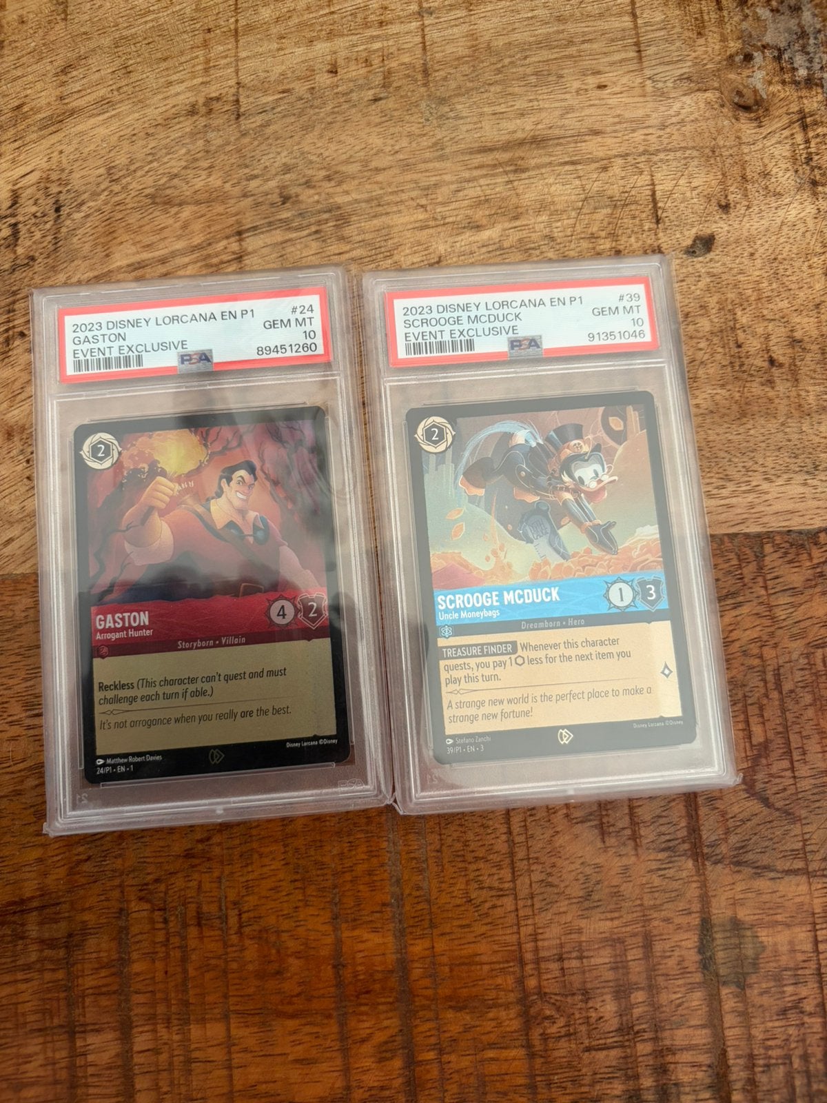 Lorcana scrooge mcduck & gaston promo psa 10, Ophalen of Verzenden, Zo goed als nieuw