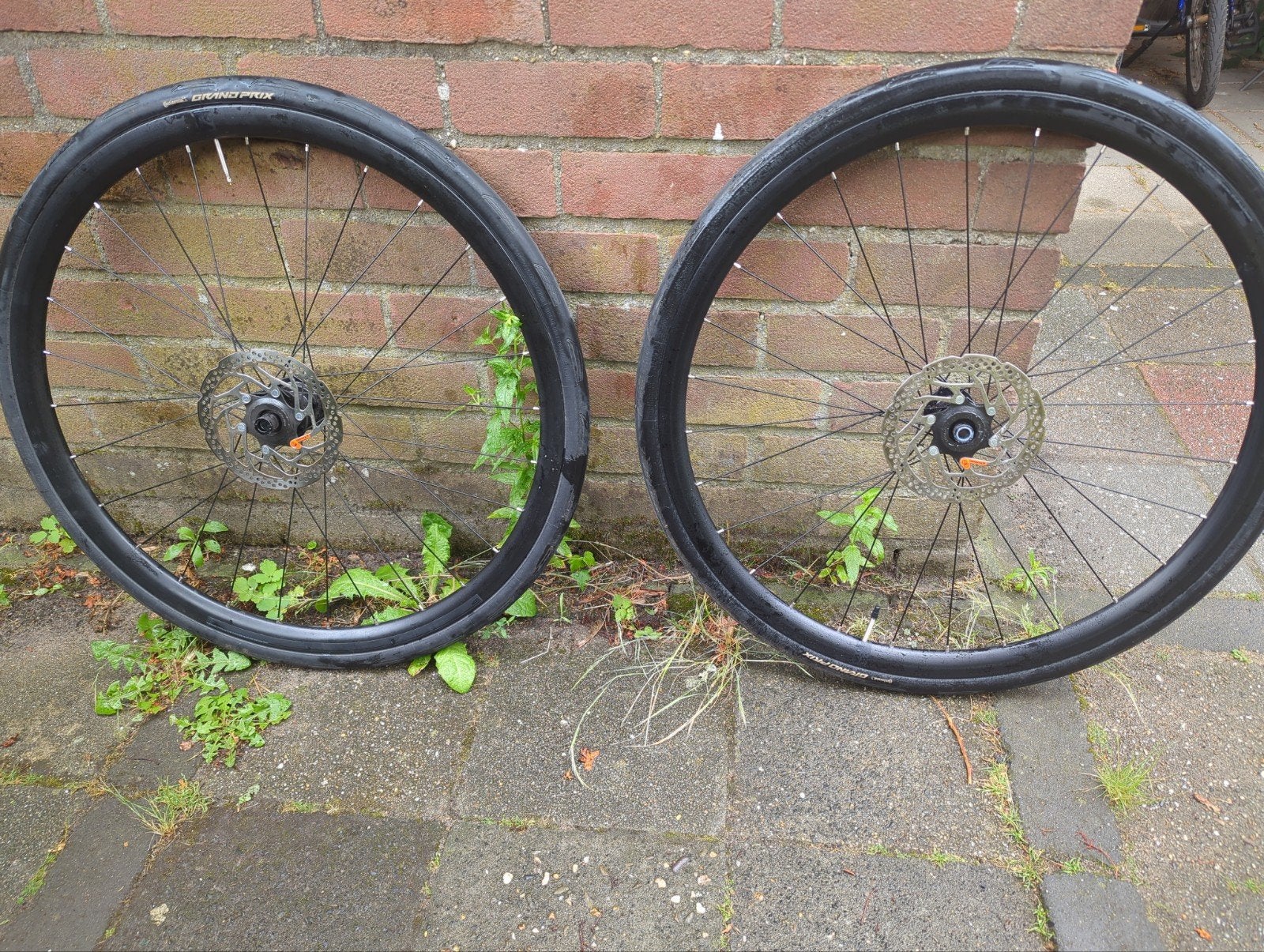 Wielset met Continental Grand Prix banden en schijfremmen, Wiel, Ophalen of Verzenden, Zo goed als nieuw, Aluminium