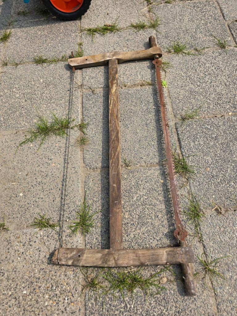 Oude boomzaag, Ophalen
