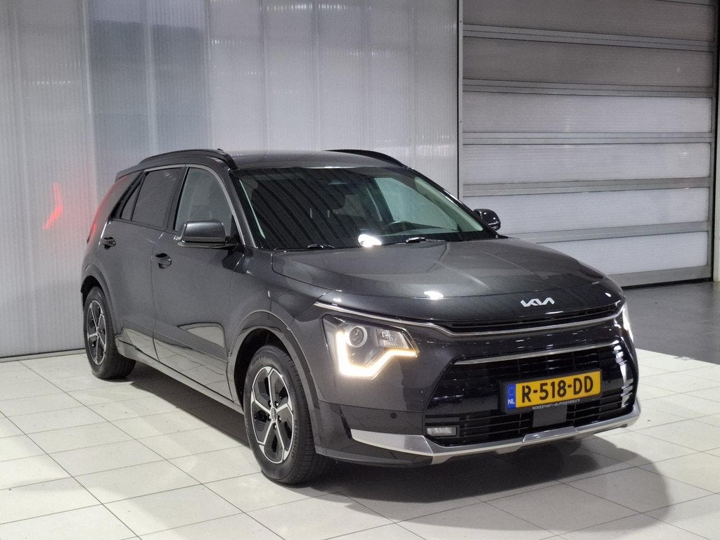 Kia Niro 1.6 GDi Hybrid DynamicLine Apple Carplay/Android Au, Auto's, Kia, 1374 kg, Gebruikt, Euro 6, Leder en Stof