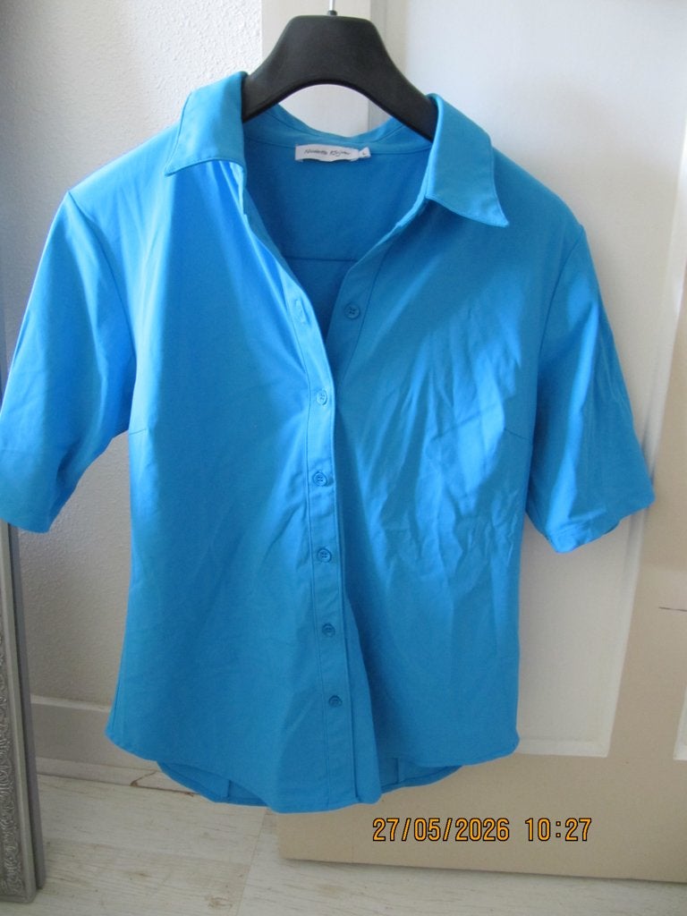 zgan lichtblauwe blouse Nicolette Kluijver travelstof maat L, Blauw, Maat 42/44 (L), Ophalen of Verzenden, Zo goed als nieuw