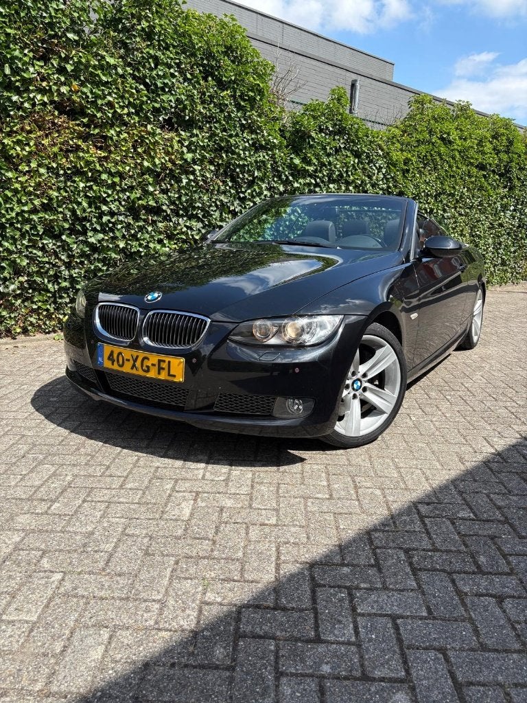 BMW 335i Cabrio High Exec. - 2007 Zwart - 2 eig. - 139.870km, Auto's, BMW, Particulier, 3-Serie, ABS, Airbags, Airconditioning