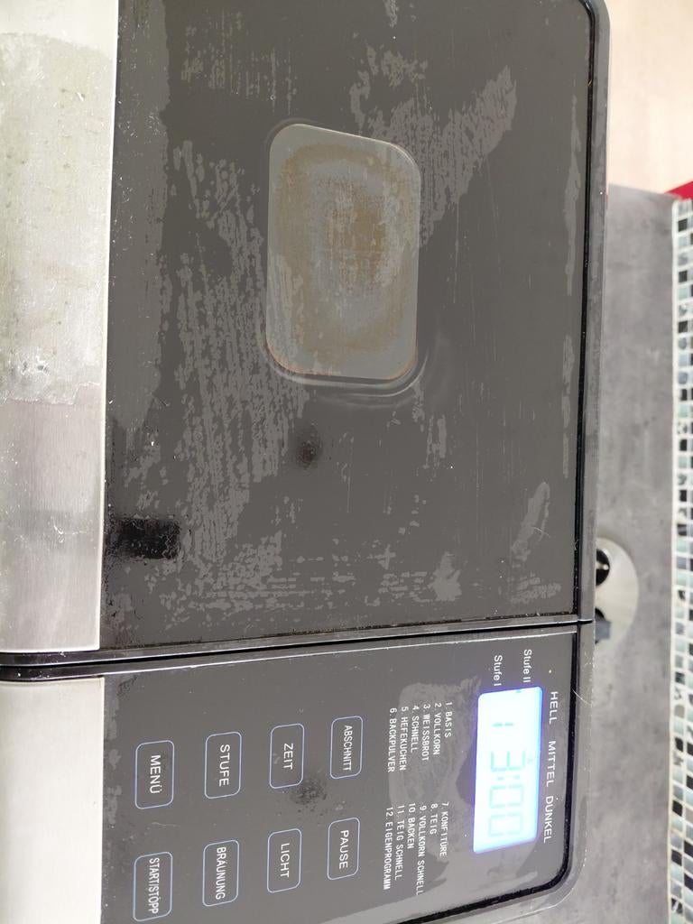 Broodbak machine werkend, Ophalen