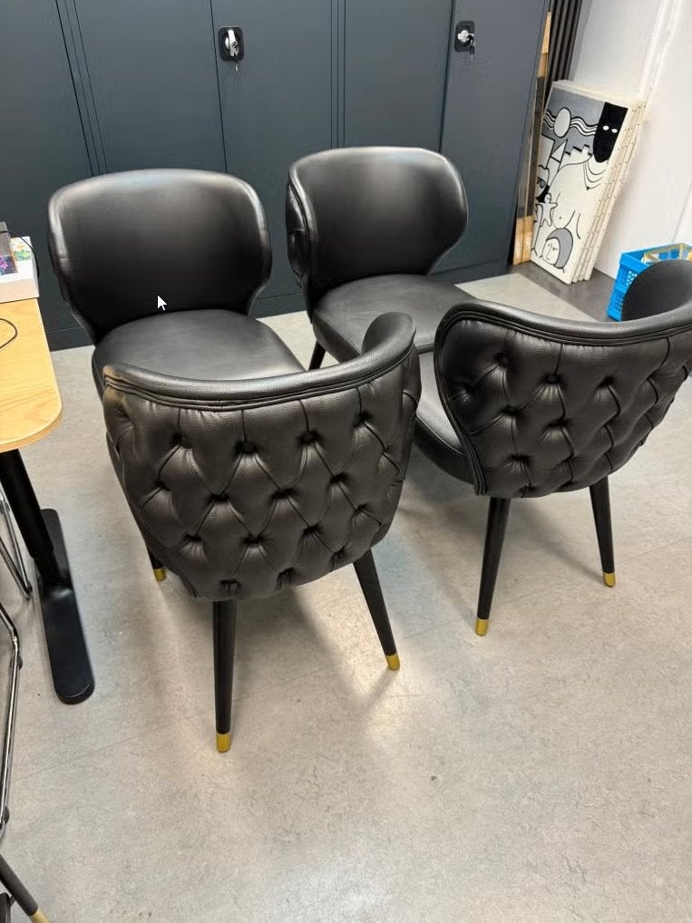 4x Leren gecapitonneerde eetkamerstoelen zwart/goud, Ophalen, Zwart, Zo goed als nieuw, Vier
