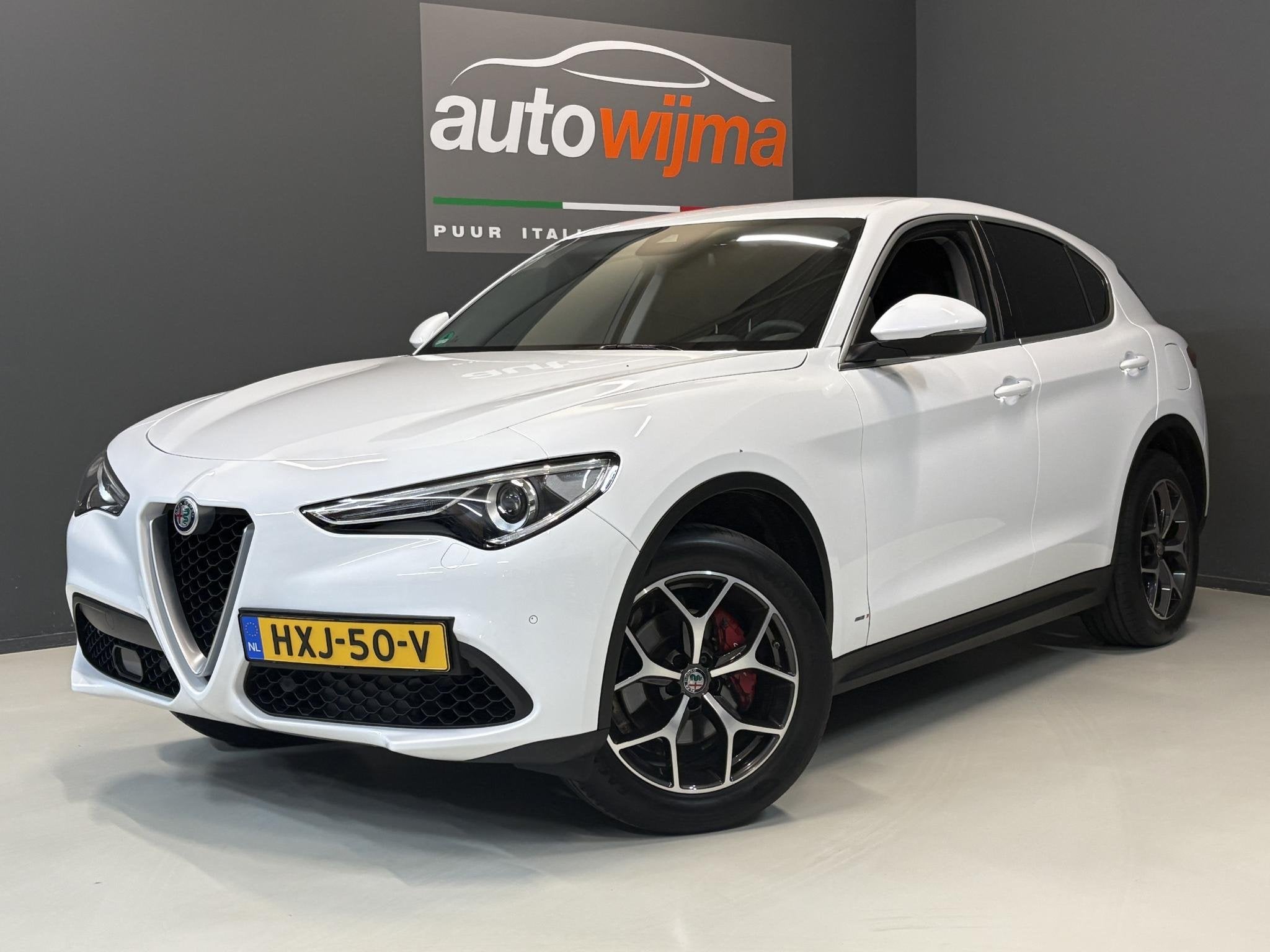 Alfa Romeo Stelvio 2.0 Turbo 280pk AWD Super Q4 Apple carpla, Auto's, Alfa Romeo, Dealer onderhouden, 4 cilinders, Wit, Leder