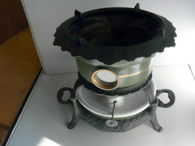 Petroleumstel # merk Haller - groen met gietijzeren basis, Antiek en Kunst, Ophalen of Verzenden