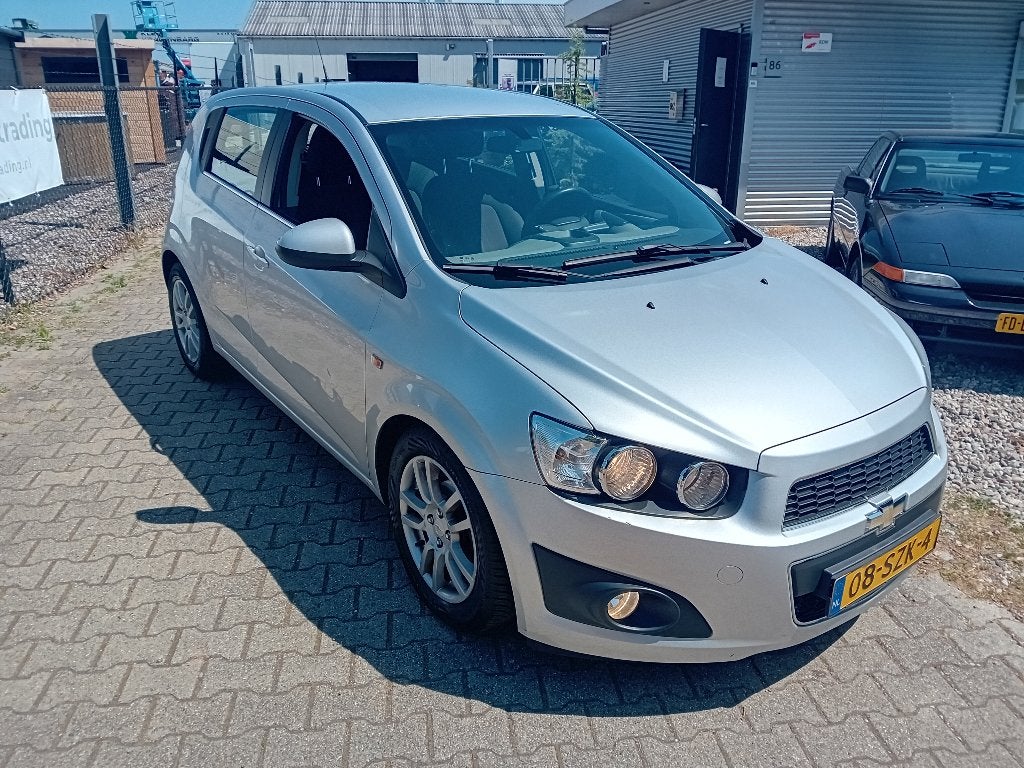 Chevrolet Aveo 1.4 5D 2012 Grijs IJSKOUDE AIRCO!! TREKHAAK!!, Voorwielaandrijving, Stof, 4 cilinders, 100 pk