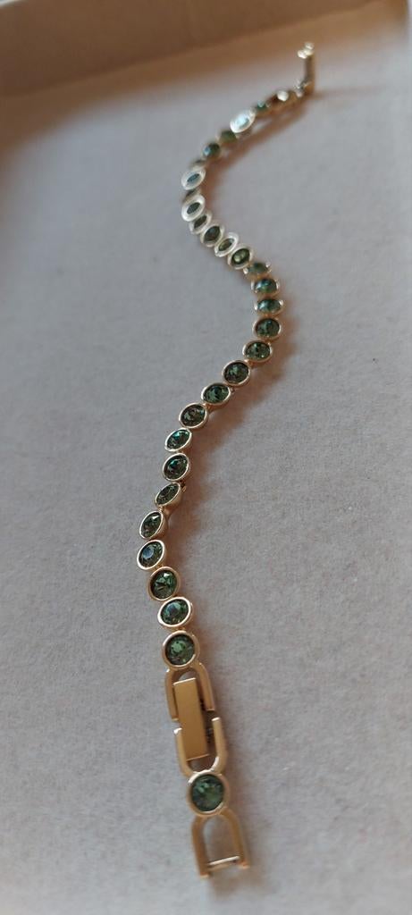 Swarovski tennisarmband goud met groene kristallen, Ophalen of Verzenden, Nieuw, Groen