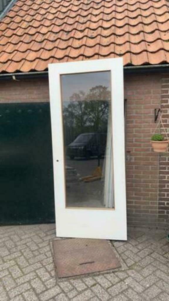 verschillende opdek paneeldeuren met blank glas 93x231.5 cm